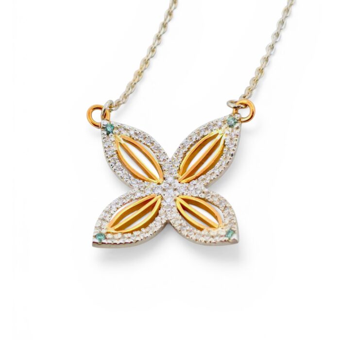 HHandgjort Blomsterhängsmycke i guld och silver med moissaniter designat av Erik Oxelgren på Kim Färm Guldsmide